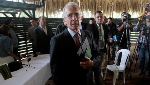 Former Colombian President Alvaro Uribe leaves after addressing the media in Rionegro, Colombia July 30, 2018.