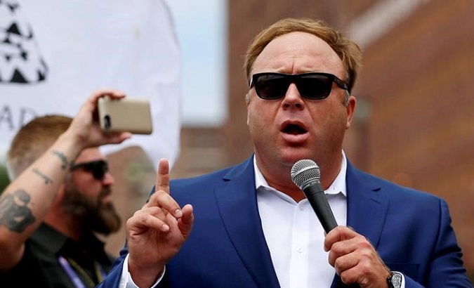Alex Jones from Infowars.com speaks during a rally in support of Republican presidential candidate Donald Trump near the Republican National Convention in Cleveland, Ohio, U.S., July 18, 2016.