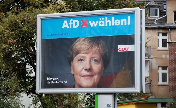 A poster by Germany's anti-immigration party Alternative fuer Deutschland reads 'Vote AfD,' September 2017.