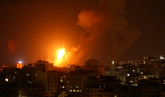 An explosion from an Israeli air strike in Gaza City on August 8, 2018.