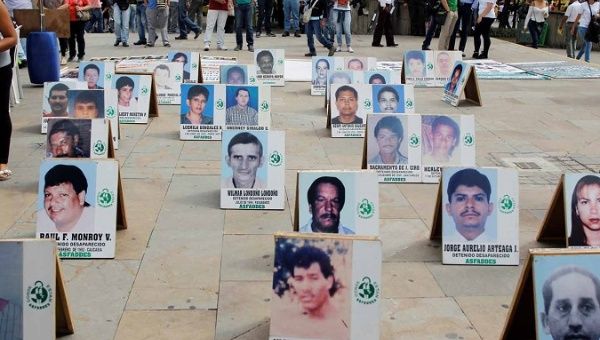 Photos of missing people mark International Day of the Victims of Enforced Disappearances in Medellín, Colombia, August 2016.