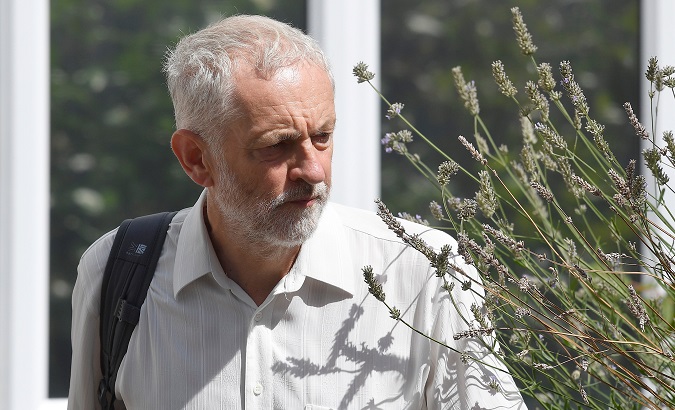 Britain's opposition Labour party leader Jeremy Corbyn leaves his house in London, Britain, August 6, 2018.