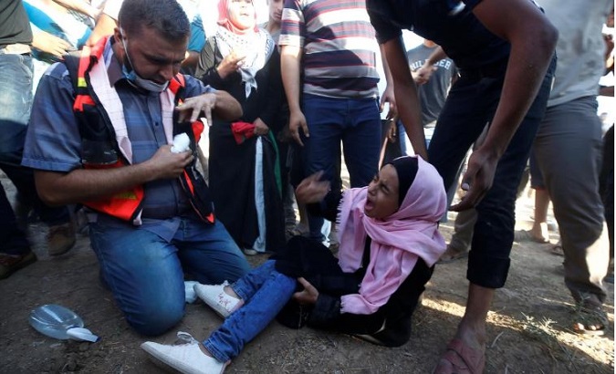 Medics said Israeli gunfire killed two men and wounded at least 270 other Palestinians, 40 of them with live bullets.