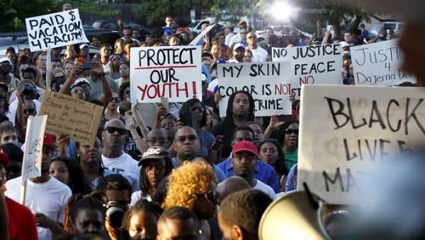 Protestors and Black Lives Matter activists in a rally against police brutality in Texas, June 8, 2015.