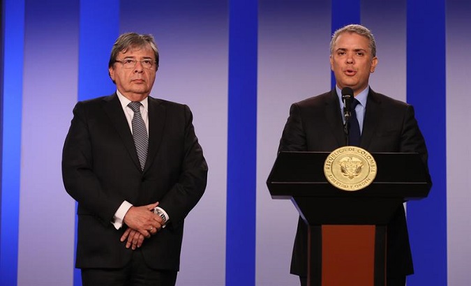 Colombian President Ivan Duque accompanied by foreign affairs minister Carlos Holmes Trujillo.