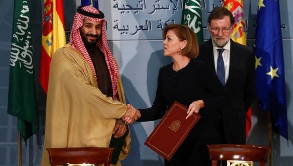Saudi Arabia's Crown Prince Mohammed bin Salman shakes hands with former Spain's Defense Minister Maria Dolores de Cospedal at the Moncloa Palace in Madrid, Spain.