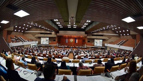 Cuban lawmakers attend a parliamentary session at the country's National Assembly in Havana.