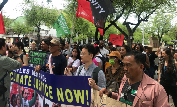 Activists demand greater action be taken at UN climate change meeting in Bangkok, Thailand.