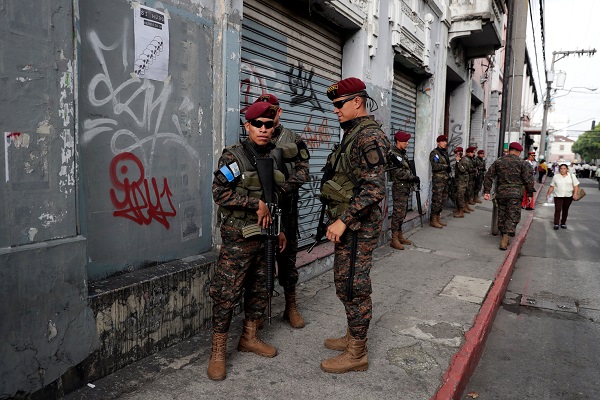 Soldiers are seen near the Congress during a protest to demand the resignation of Guatemala's President Jimmy Morales in Guatemala City, Guatemala September 12, 2018. 