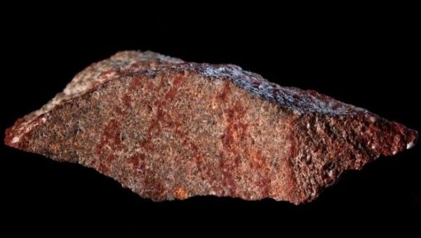 Humanity used ochre, a clay earth pigment, for at least 285,000 years.