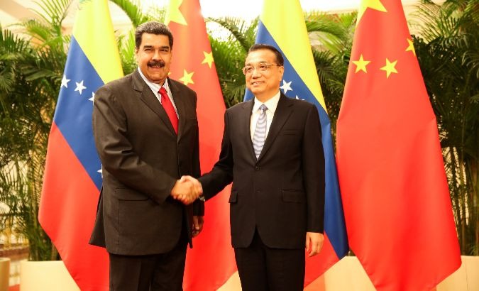 Venezuela's President Nicolas Maduro and Chinese Premier Li Keqiang meet in Beijing.