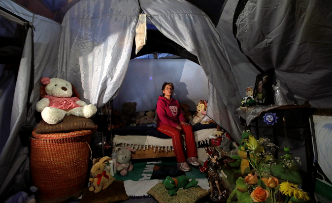 Maria Guadalupe Padilla rests in her tent in the Tlalpan neighborhood.