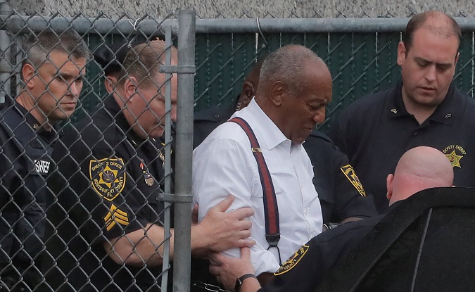 Cosby leaves the Montgomery County Courthouse in handcuffs after sentencing in his sexual assault trial in Norristown, Pennsylvania, U.S., Sept. 25, 2018.