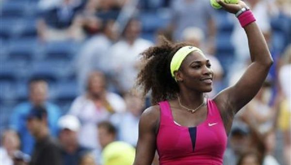 Serena Williams of the U.S. celebrates after defeating Maria Jose Martinez Sanchez of Spain during their women's singles match at the U.S. Open tennis tournament in New York August 30, 2012. 