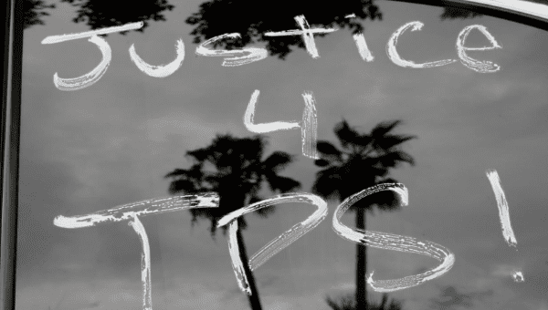 Paint is seen on cars before members of the Teamsters Union participate in a tractor trailer caravan surrounding the LA Metro Detention Center in support of port truck drivers and others threatened by deportation if the courts or congress don't stop the termination of Temporary Protected Status (TPS) in Los Angeles, California, U.S. October 3, 2018. 