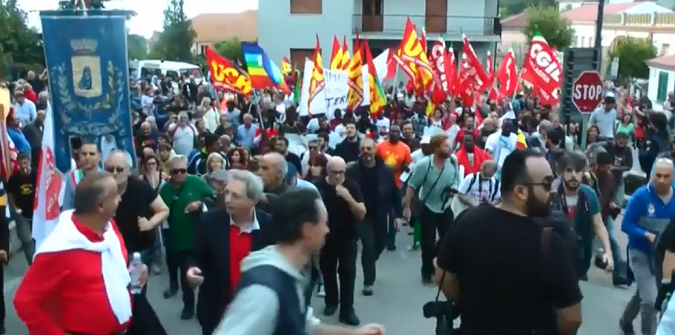 Thousands of people marched Riace, Italy on Saturday to show solidarity with its mayor Domenico Lucano, who is under house arrest for allegedly favouring illegal migration.