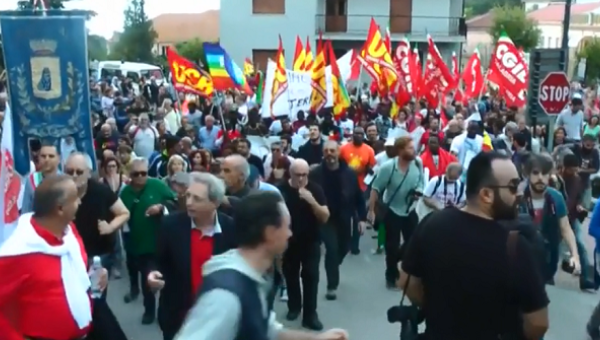 Thousands of people marched Riace, Italy on Saturday to show solidarity with its mayor Domenico Lucano, who is under house arrest for allegedly favouring illegal migration.