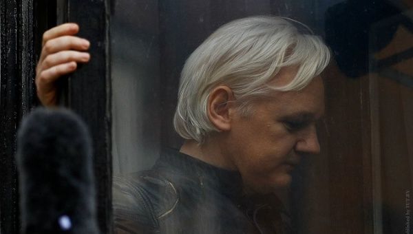 WikiLeaks founder Julian Assange is seen on the balcony of the Ecuadorean Embassy in London, Britain.