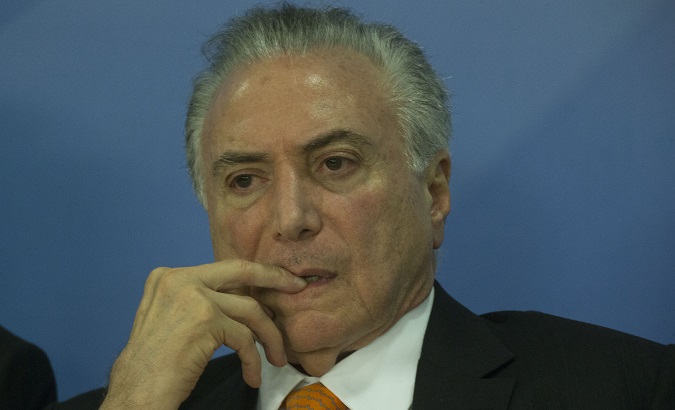 Police officials say there are strong implications indicating President Michel Temer may have been receiving bribes.and abusing his authority.