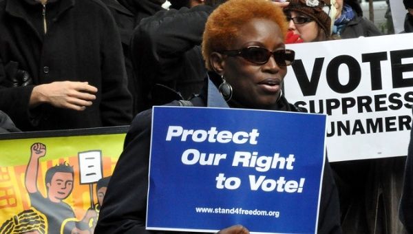 In Georgia, USA, 107,000 purged from voter registration rolls.