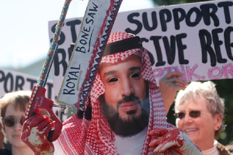 An activist dressed as Saudi Crown Prince Mohammad bin Salman holds a prop bonesaw during a demonstration calling for sanctions against Saudi Arabia outside the White House in Washington, U.S., October 19, 2018. Khashoggi was a Washington Post Columnist and a strong critic of the Crown Prince. 