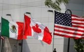 Flags of the U.S., Canada and Mexico fly next to each other in Detroit, Michigan, U.S.