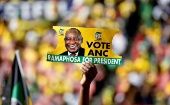 A supporter holds a placard of Cyril Ramaphosa in Johannesburg, South Africa, May 5, 2019.