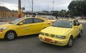 La protesta de este miércoles logró reunir a unos 15.000 taxistas agremiados en la ciudad capital ecuatoriana. 