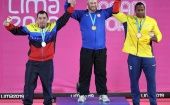 Wessley Kitts de Estados Unidos, medalla de oro, Jeyson Arias de Venezuela y Jorge Arroyo de Ecuador, bronce, en levantamiento de pesas 109kg. 