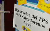  Signs direct arrivals to the TPS registration in El Salvador consulate in Los Angeles, Californi, 2016.