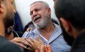 A Palestinian man reacts in Shifa hospital after learning his relative was killed in Gaza November 13, 2019.