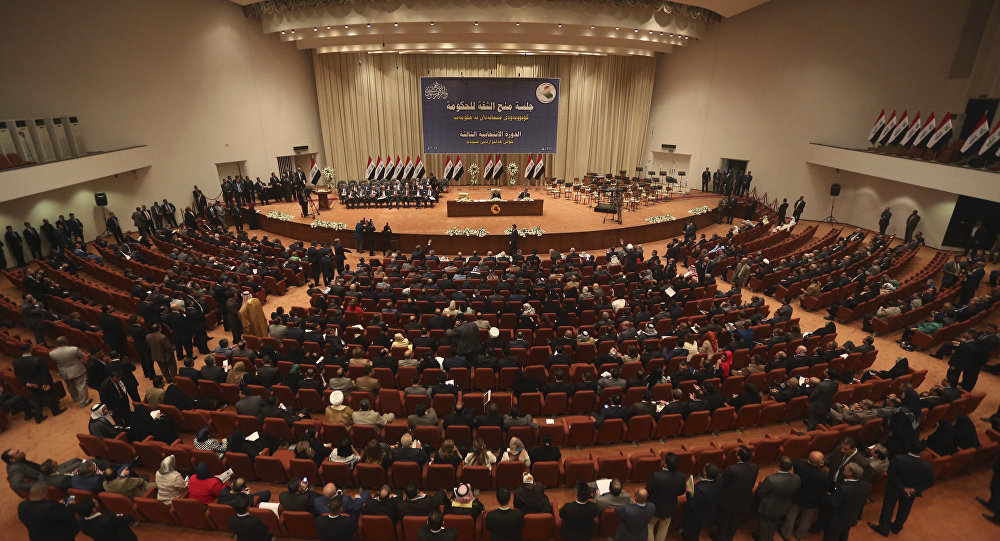 “En nombre de Irak y del pueblo, en nombre de los mártires (...) la ley ha sido aprobada”, dijo el presidente del Consejo de Representantes, Mohamad al-Halbusi.