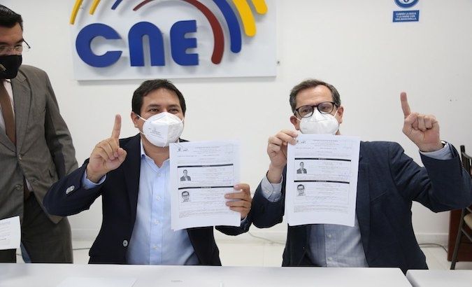 Andres Arauz (L) and Carlos Rabascall (R) registered before the National Electoral Council, Quito, Ecuador, Oct. 2, 2020.