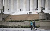 People wear masks at the Lincoln Memorial in Washington D.C., U.S., Oct. 12, 2020.