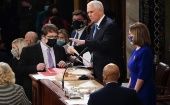 U.S. Vice President Mike Pence (C) and U.S. House Speaker Nancy Pelosi (R) take part in a joint session of the Congress to certify the 2020 election results at the U.S. Capitol in Washington, D.C., the United States, Jan. 6, 2021.