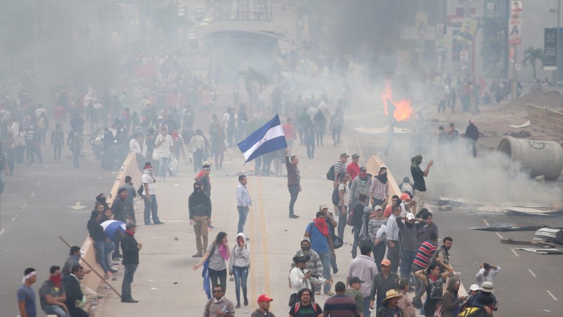 El período presidencial de Juan Orlando Hernández, en Honduras, ha estado signado por la protesta popular en contra de sus políticas.