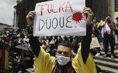 The sign reads,"Duque Out," Colombia, Sept. 28, 2021.