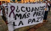 The banner reads, "How many more deaths are needed for peace to come?", Colombia, 2021.