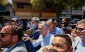 The former president of Argentina Mauricio Macri walks through the crowd after testifying before a judge for the first time after leaving power, today, in the city of Dolores (Argentina).