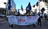 The banner reads, "Up the Mapuche fight! The Military outside," Chile, Nov. 4, 2021. 