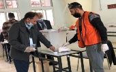 A man casts his vote, Palestine, Dec. 11, 2021. 