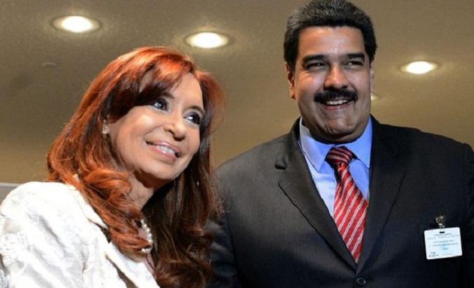 Venezuelan President Nicolas Maduro (R) and Argentina