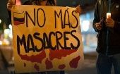 "No more massacres," reads the sign. Jan. 19, 2023. 