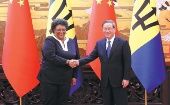 Barbados PM Mia Mottley (L) and Premier Li Qiang (R) in Beijing, China, June 26, 2023.