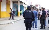 Police inspect a crime scene in Manabi, Ecuador, Sept. 24, 2023.