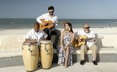 People singing boleros on the beach of Progreso in Merida, Mexico, 2022.