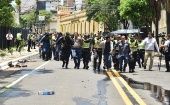 Police arrest Sitrande workers, Asuncion, Paraguay, Dec. 12, 2023