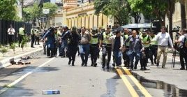 Police arrest Sitrande workers, Asuncion, Paraguay, Dec. 12, 2023