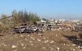 Cars destroyed by US airstrike in Iraq, Dec. 26, 2023.