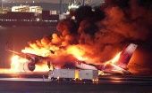 Plane catches fire at Haneda airport, Tokyo, Japan, January 2, 2024.